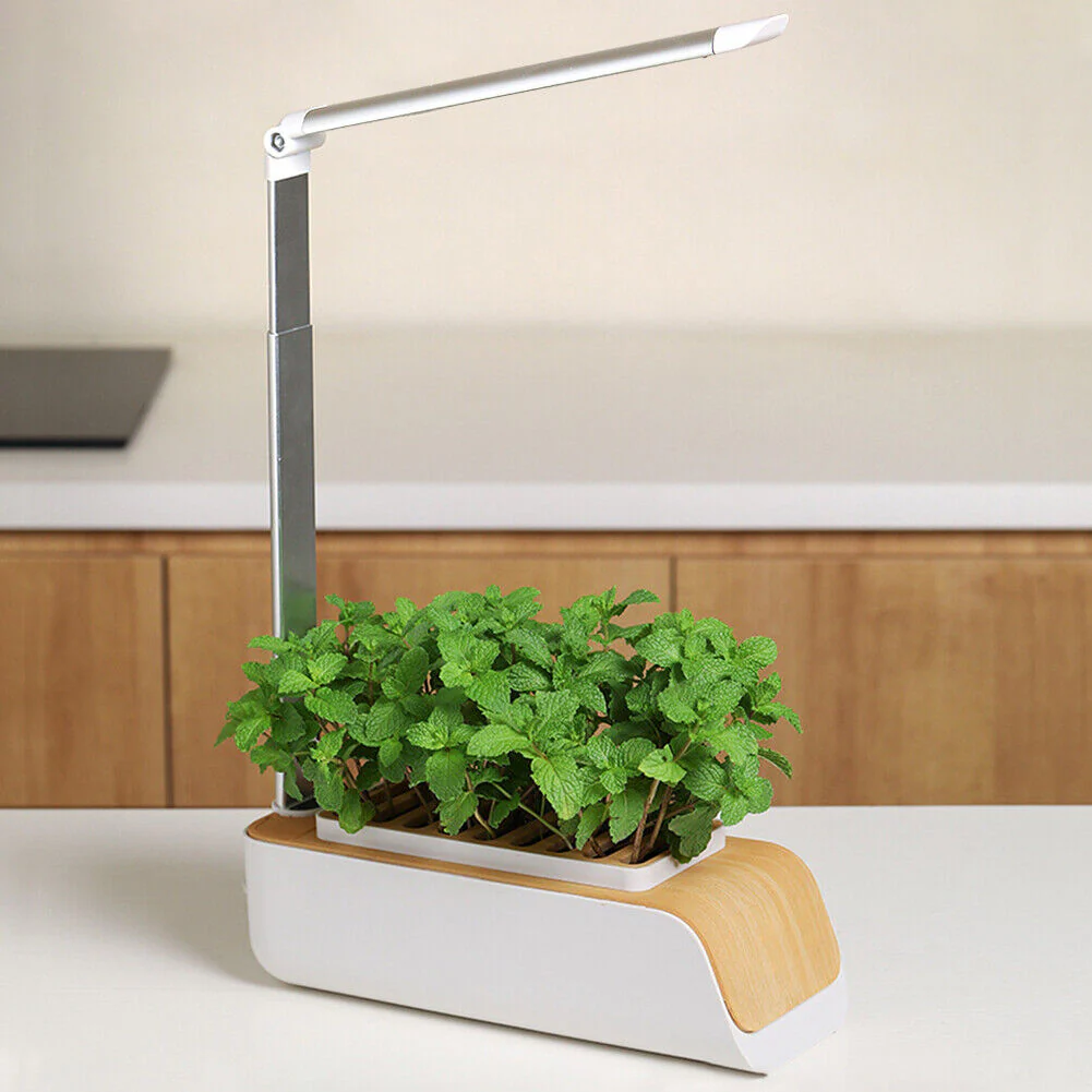 Using grow lights with self watering planters